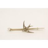 Victorian gold pin with pearl and rose diamond, swallow on knife edge, probably 15ct. 3.7g