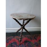 Gypsy table, cloth covered top on bobbin turned supports.