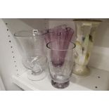 Clear glass vase of urn form, an amethyst vase, a fluted glass vase and an Arthur Wood vase  (4)