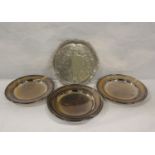 E.p. circular engraved waiter on claw feet and a set of three Walker and Hall epns plates (4)