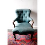 Victorian button back armchair, show-wood rosewood forearms and turned baluster front supports.
