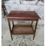 Two tier occasional table, pierced gallery to lower tier and supports.