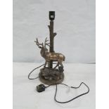 Table lamp in the form a stag, a chrystoleum and a gilt mirror. (3)
