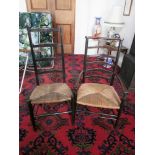 Arts & Crafts style ladder back low armchair, c1900, with rush seat, and a similar side chair.  (2).