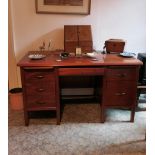 Good quality 1950's writing desk, pull out slides, frieze drawer and five graduated drawers, on