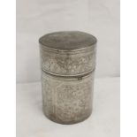 Chinese pewter canister with incised floral panels, impressed character marks to base. 17.5cm