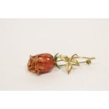 Gold and enamel rosebud brooch, the pin marked "750"