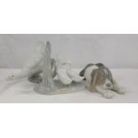 Lladro porcelain figure of a sleeping puppy and two Nao figures of geese (3)