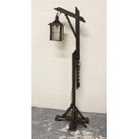 Reproduction dark oak lantern standard lamp (electrical rewiring required).