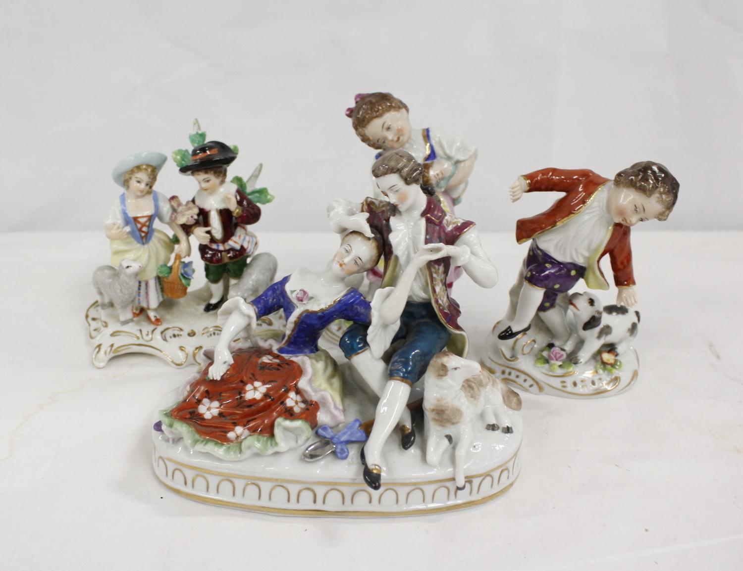 Three Sitzendorf porcelain figures and another (4)