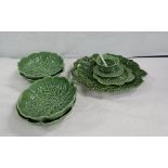 Various cabbage leaf moulded dishes and cabbage sauce boat on stand