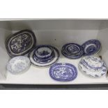 Collection of blue and white willow pattern and other china