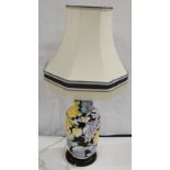 Modern floral decorated pottery table lamp and shade. 78cm high (electrical testing and re wiring
