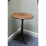 Victorian rosewood circular occasional table, spiral twist column and tripod supports.