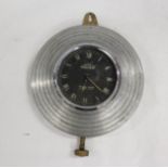 British Jaeger dashboard clock in stepped circular metal surround. 15.5cm dia.