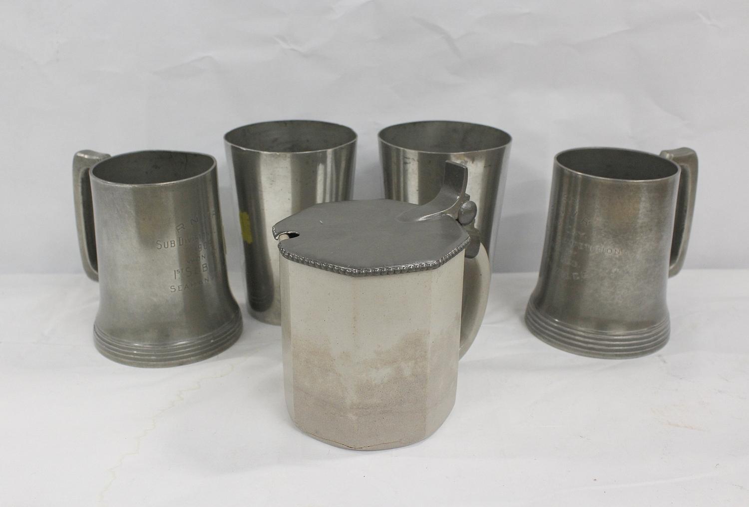 Two pewter beakers, two pewter mugs and a half litre stoneware mug with pewter cover (5)