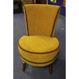 Upholstered circular bedroom chair.