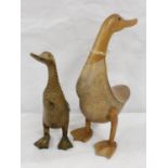 Two carved wooden figures of ducks, the largest 35cm