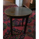 Edwardian mahogany small oval occasional table, chequered edging and square tapered supports.