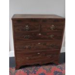 19th century oak and mahogany crossbanded chest, two short and three long drawers, bracket feet