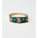 Emerald and diamond half hoop ring with two rectangular emeralds, each approximately 5mm x 4mm,