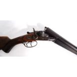12 bore hammer action side by side shotgun, barrel length 76cm.Purchaser must be in possession of