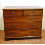 Mahogany chest with moulded rectangular top over two short and three graduated long boxwood-strung