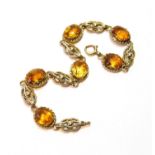 Gold bracelet with six citrines, probably 9ct, 14g gross.