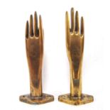 Pair of brass glove stretchers, 28cm high.