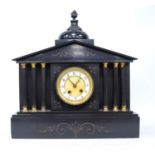 Late Victorian slate Palladian mantel clock with circular face, Arabic numerals, striking coil