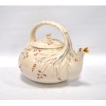 19th century Belleek teapot, the spout modelled as a bird with ribbon twist handle and floral