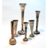 Pair of silver embossed vases, W. Comyns, 1894, and four others, loaded.