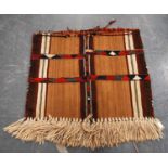 Salt bag with panel design, and large tassels, 87cm x 74cm.