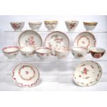 Assorted late 18th century tea bowls and saucers decorated with garlands.