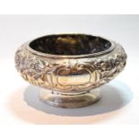 Irish silver sugar bowl of compressed circular shape, embossed with flowers upon matting, maker