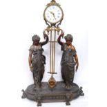 Late 19th century spelter mystery clock in the form of two classical female figures holding aloft