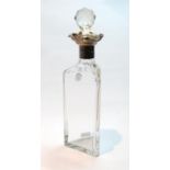 Cut glass spirits decanter of triangular section, with silver mount, W. Comyns, 1903.