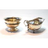 Silver circular bowl, and a sauce boat with shaped edge, 5oz.  (2)