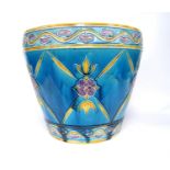 Minton Secessionist planter with floral decoration over blue glaze, no. 616446, 31cm high and 37cm