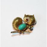 Gold brooch by Van Cleef & Arpels, modelled as a squirrel with a ruby and diamond-set eye and