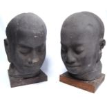 Pair of large composite busts on wooden plinths, 44cm high.  (2)