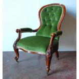 Victorian mahogany button-back open armchair with moulded frame, scroll-carved arms, serpentine