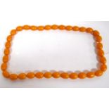Vintage butterscotch amber-type bead necklace, 180g approximately.