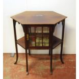 Aesthetic mahogany occasional table, the elongated hexagonal top over open shelves, and glazed