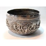 Burmese silver bowl with typical deeply-chased scenes of figures and landscapes, 21.5cm, 31oz.