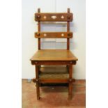 Late Victorian oak Gothic set of library steps with pierced horizontal splats, tapering seat, and