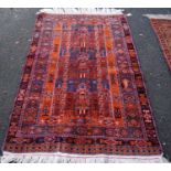 Rug, the central field with three marquees, and triple border, 200cm x 125cm.