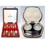 Set of six silver dessert forks, and a pair of butter shells, with knives, both cased, 8oz.