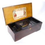 Swiss 19th century faux rosewood six-tune music box, the moulded rectangular top enclosing the