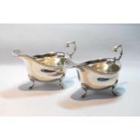 Pair of silver sauce boats with gadrooned edges, on scallop and pad feet, 1938, 6oz.